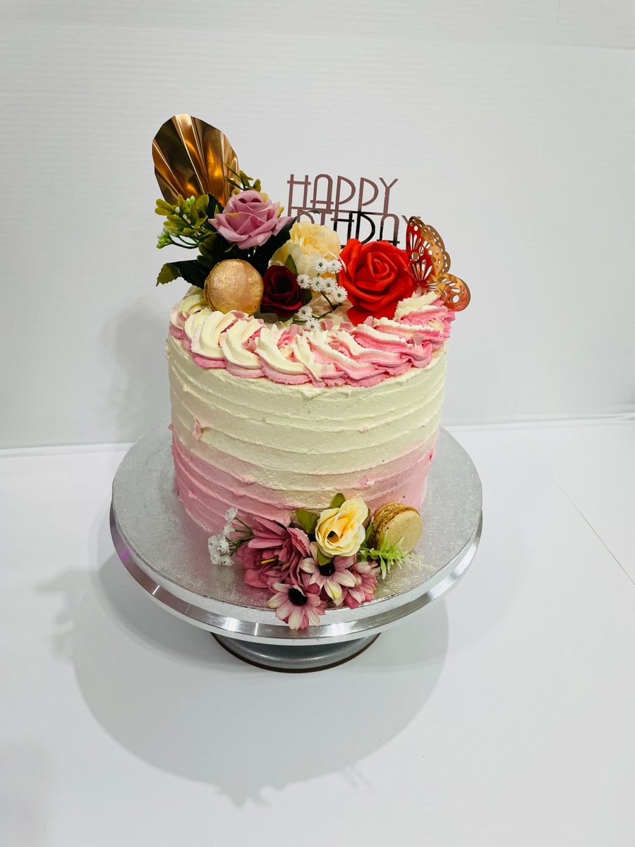 Floral pink ombre birthday cake